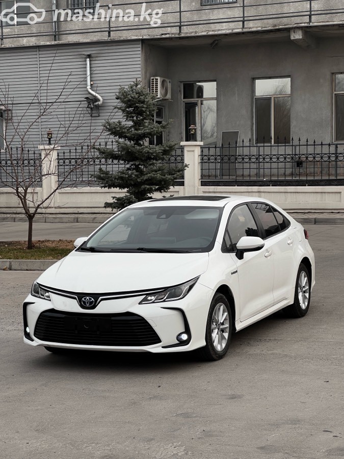 Toyota Corolla XII (E210) фото номер 2