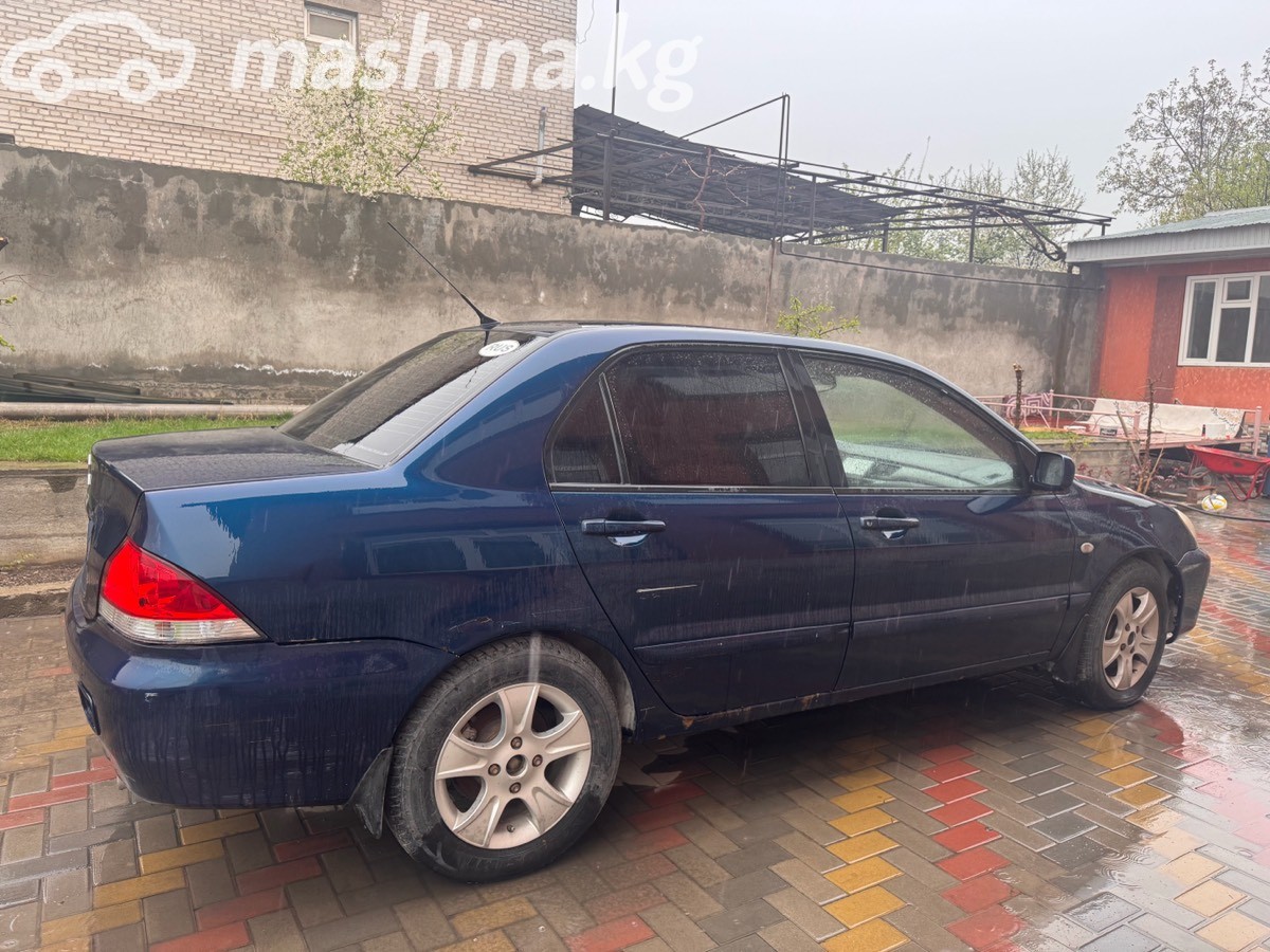 Mitsubishi Lancer IX Рестайлинг фото номер 3