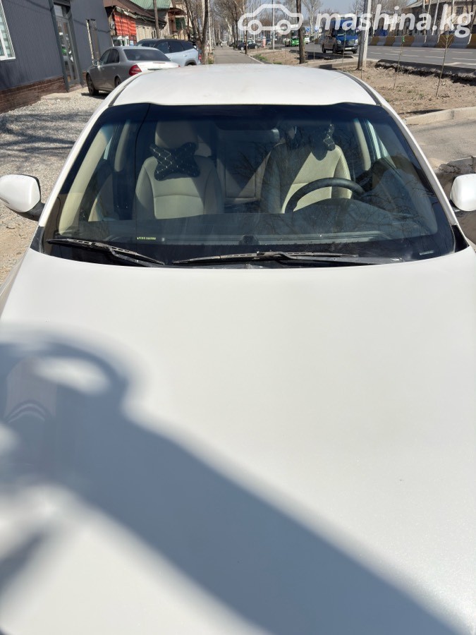 Kia K5 II фото номер 7